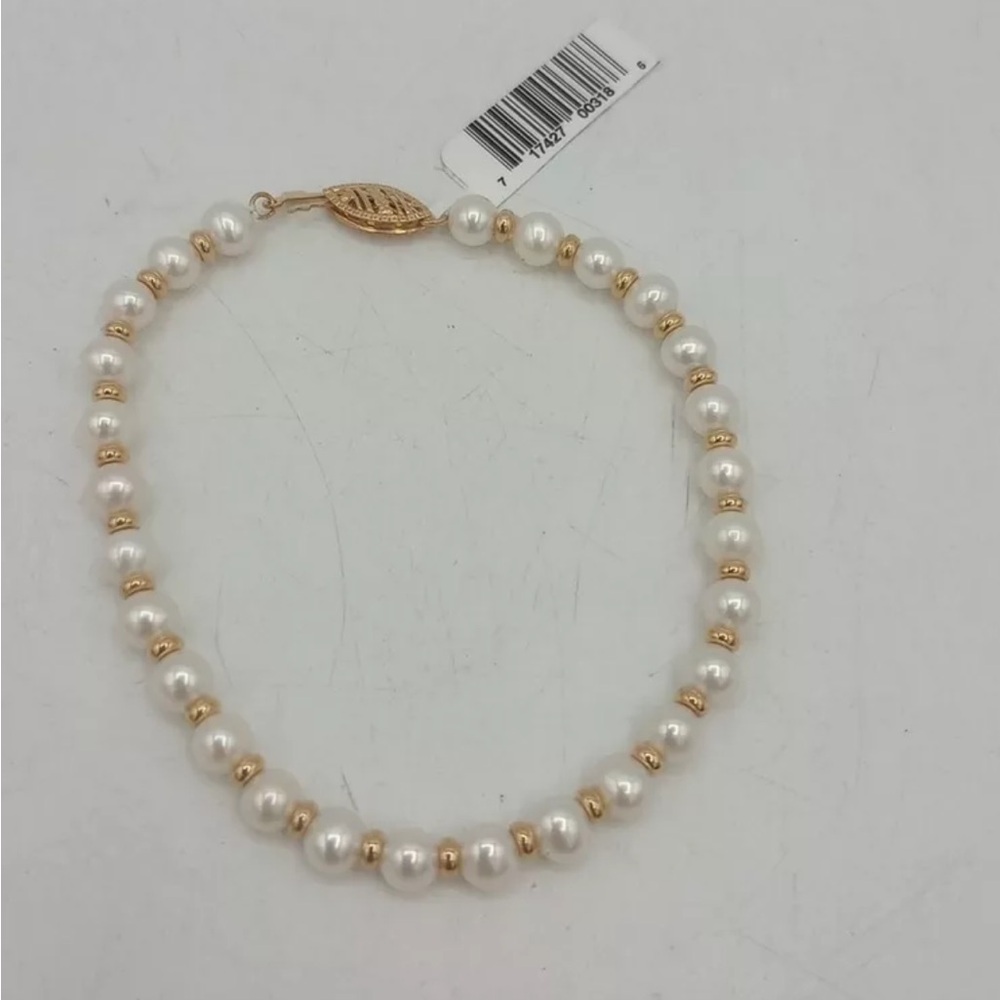 Brand new 14 k gold and pearl bracelet